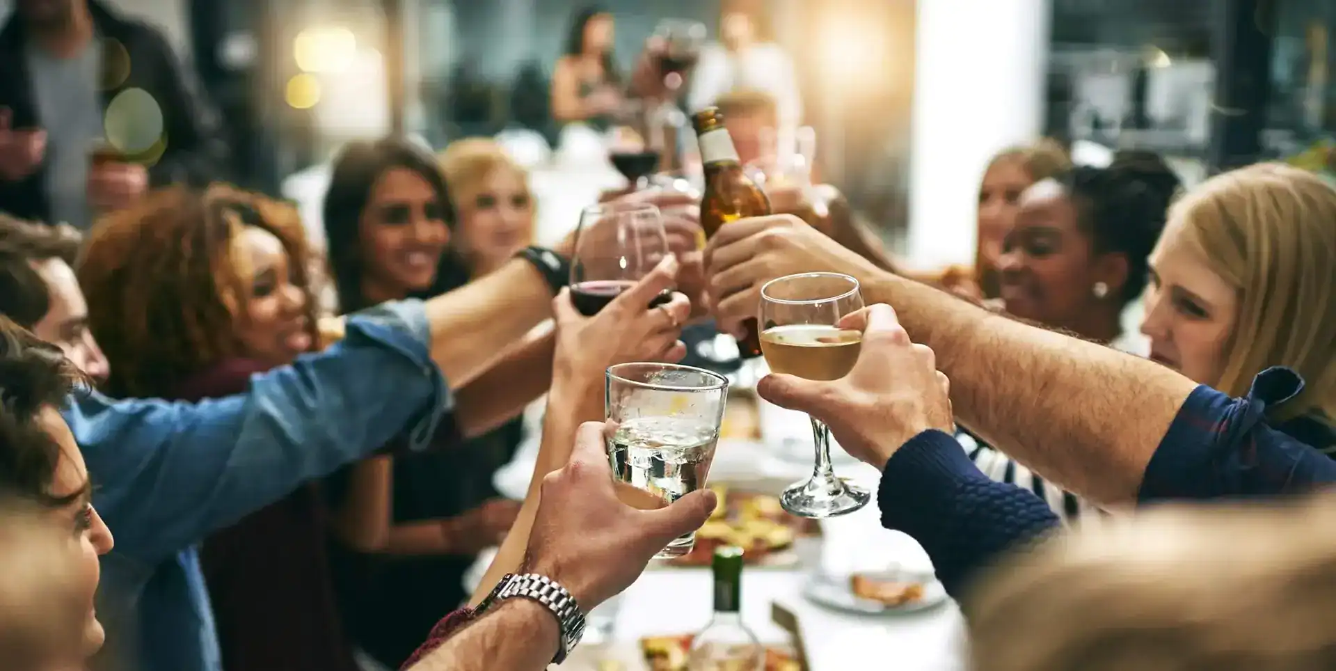 Customers toast in a restaurant