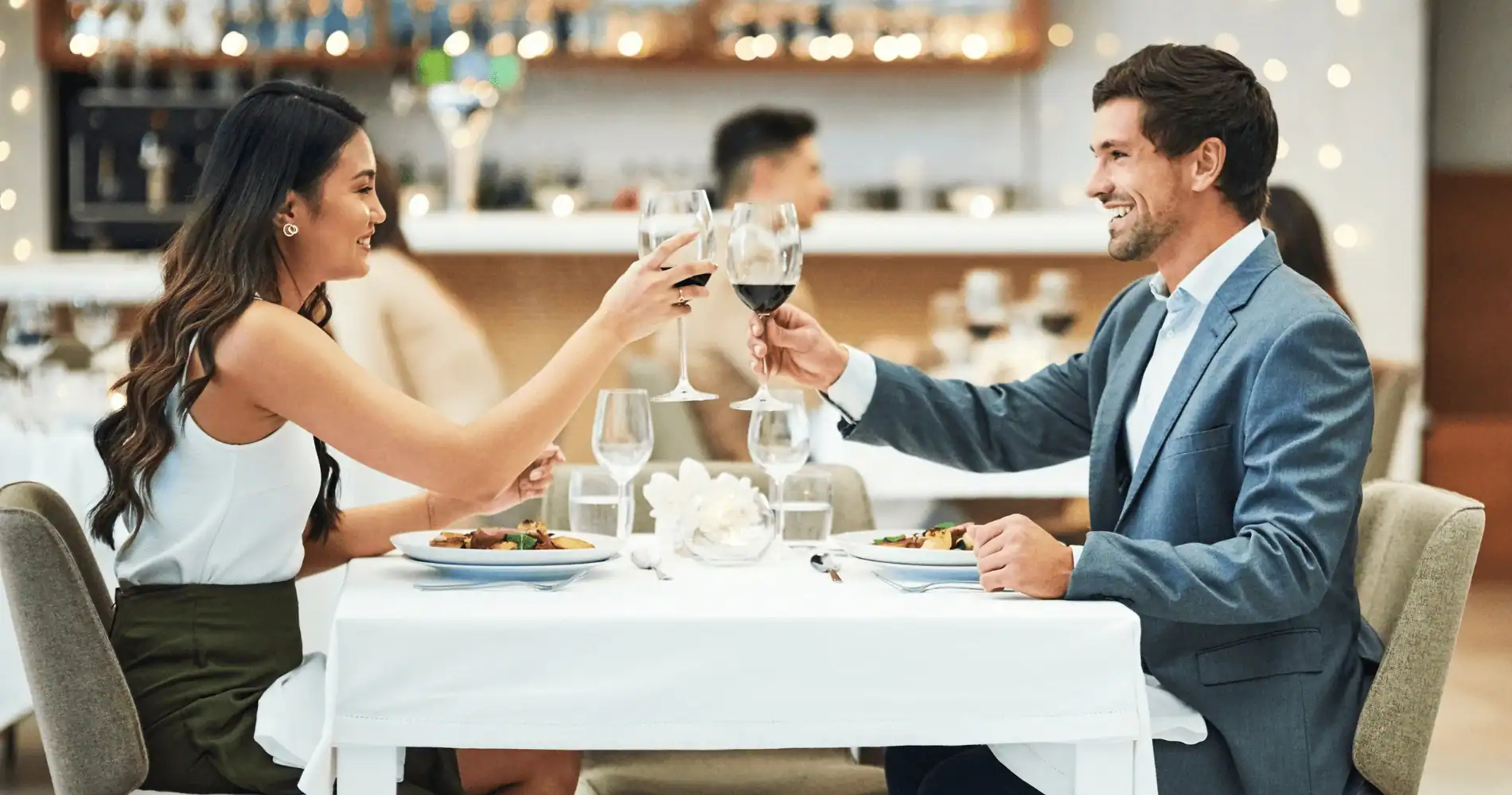 A couple is having diner in a fine dining restaurant listed in The MICHELIN Guide